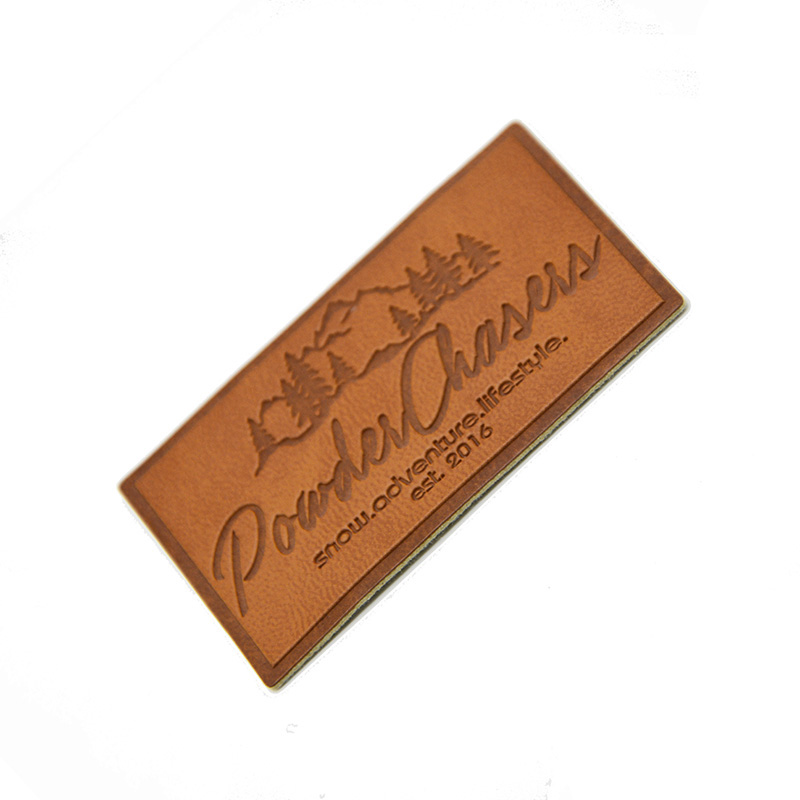 pressed pu leather badge